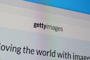 Homepage of gettyimages website on the display of PC, url - gettyimages.com. photo