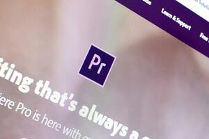 Web page of adobe premiere product on official website on the display of PC photo