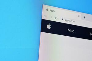 Homepage of apple website on the display of PC, url - apple.com. photo