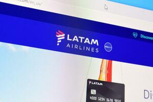 Homepage of latam airlines website on the display of PC, url - latam.com. photo