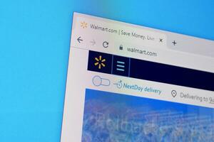 Homepage of walmart website on the display of PC, url - walmart.com. photo