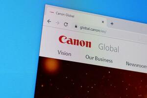 Homepage of canon website on the display of PC, url - global.canon. photo