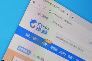 Homepage of ctrip website on the display of PC, url - ctrip.com. photo