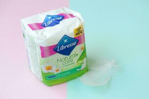 Libresse pad pack. Libresse is an international brand of feminine hygiene products owned by SCA, a Swedish pulp and paper manufacturer and consumer goods company photo