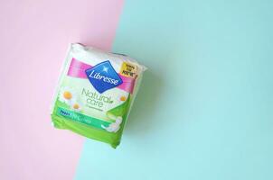 Libresse pad pack. Libresse is an international brand of feminine hygiene products owned by SCA, a Swedish pulp and paper manufacturer and consumer goods company photo