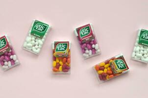 Many Tic Tac Candy packages. Tic tac is popular due its minty fresh taste and easy to carry. Hard mints produced by Ferrero since 1968 photo