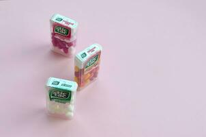 Many Tic Tac Candy packages close up. Tic tac is popular due its minty fresh taste and easy to carry. Hard mints produced by Ferrero since 1968 photo