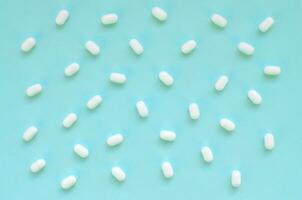 Tic tac hard mints pattern close up. Tic tac is popular due its minty fresh taste and easy to carry. Hard mints produced by Ferrero since 1968 photo