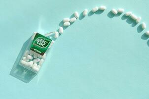 Many hard mints and Tic Tac Candy package. Tic tac is popular due its minty fresh taste and easy to carry. Hard mints produced by Ferrero since 1968 photo