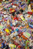 KHARKOV, UKRAINE - AUGUST 10, 2021 Big pile of various wrappings and empty disposable packages and cups from famous branded food production photo
