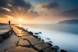 a man standing on a stone walkway overlooking the ocean at sunset. AI-Generated photo