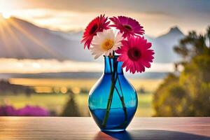a blue vase with pink flowers on a table in front of a mountain. AI-Generated photo