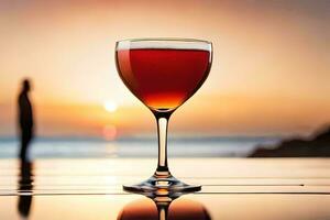 a glass of red wine on a table in front of the sunset. AI-Generated photo
