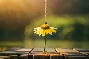 a single yellow flower hanging from a wooden plank. AI-Generated photo