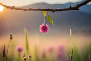 a pink flower is hanging from a branch in front of a field. AI-Generated photo