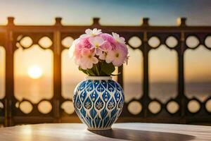 a vase with pink flowers on a table in front of the sunset. AI-Generated photo