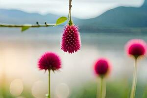 pink flowers are growing in front of a lake. AI-Generated photo
