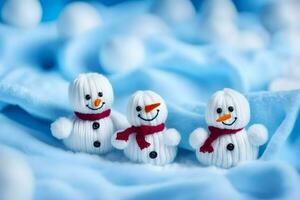 Tres muñecos de nieve son sentado en un frazada. generado por ai foto