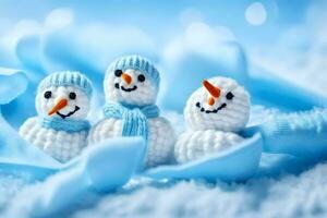 three snowmen are knitted together in blue and white. AI-Generated photo