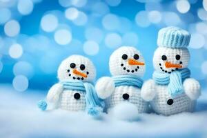 three snowmen in blue and white hats and scarves. AI-Generated photo