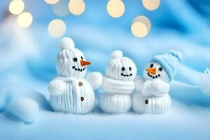Tres muñecos de nieve son sentado en un azul antecedentes. generado por ai foto