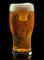 A glass of cold fresh beer with cap of foam. Splash of foam with tasty american beer. Beer day concept by AI Generated photo