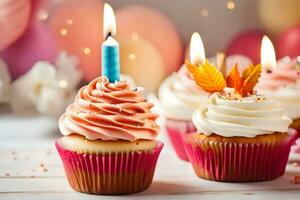 three cupcakes with candles on them. AI-Generated photo