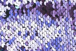 púrpura resumen lentejuelas espumoso antecedentes. textura de lentejuelas foto