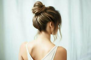 A beautiful bride with a bun hairstyles for long hair look from back. A female hairstyle rear view concept by AI Generated photo