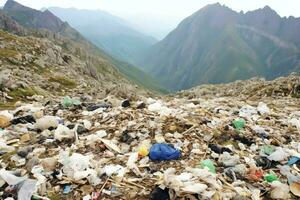 Environmental problem plastic garbage or trash in the mountain from global warming. Pollution concept by AI Generated photo