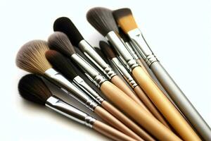 Set of professional makeup brushes cosmetic accessories set on white background. Makeup tool concept by AI Generated photo