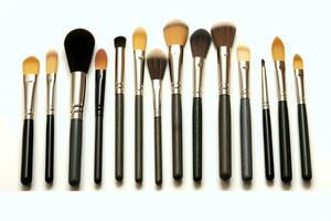 Set of professional makeup brushes cosmetic accessories set on white background. Makeup tool concept by AI Generated photo