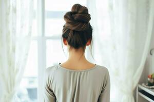 A beautiful bride with a bun hairstyles for long hair look from back. A female hairstyle rear view concept by AI Generated photo