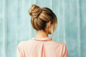 A beautiful bride with a bun hairstyles for long hair look from back. A female hairstyle rear view concept by AI Generated photo