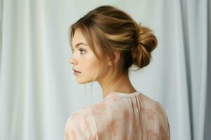 A beautiful bride with a bun hairstyles for long hair look from back. A female hairstyle rear view concept by AI Generated photo