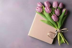 Decorative of tulips flowers bouquet or wrapped gift box. For mothers day or valentine with copyspace concept by AI Generated photo