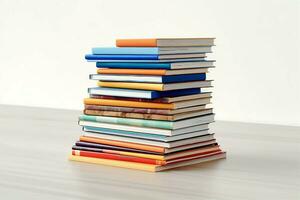 A book pile close up on a table. Front view pile book. For festival of world book day, national book day or national education day. Stack of colorful books on white background by AI Generated photo