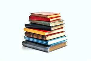 A book pile close up on a table. Front view pile book. For festival of world book day, national book day or national education day. Stack of colorful books on white background by AI Generated photo