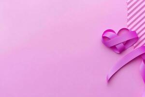 Pink or purple ribbon as breast cancer or epilepsy awareness symbol and copy space. World cancer day concept by AI Generated photo