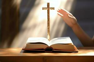 Close up of a holy bible and christian cross on wooden table. Happy good friday or religion concept by AI Generated photo