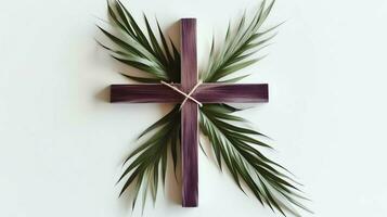 un cristiano de madera cruzar crucifijo firmar con verde palma hojas como religioso día festivo. palma domingo evento concepto por ai generado foto