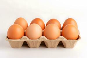 Eggs in egg carton isolated on white background photo