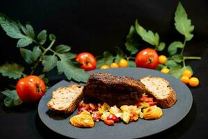 Veal shoulder with a fresh salad photo