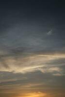 Colored Clouds at Sunset near the Ocean photo