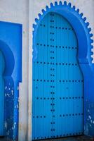 Traditional moroccan door detail in Chefchaouen, Morocco, Africa photo