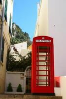 de cerca detalle de icónico británico teléfono caja situado en Gibraltar foto