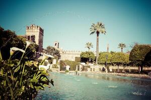 The famous Alcazar with beautiful garden in Cordoba, Spain photo