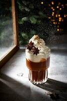 Glass of hot chocolate with whipped cream. Sugar powder snow. Christmas lights. Cozy winter still life. photo