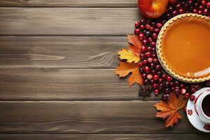 Pumpkin pie with berries and autumn leaves on brown wooden table. photo