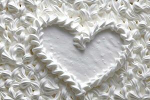 Heart made of whipped cream. photo